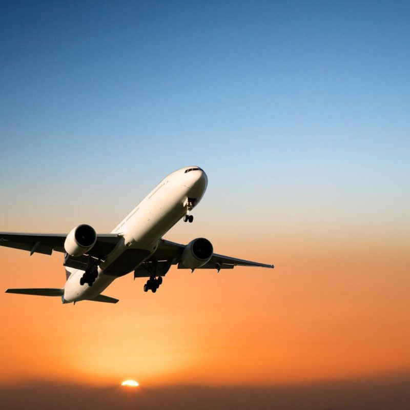 Aircraft Landing at Sunset