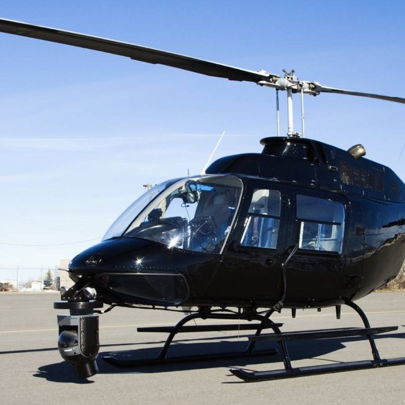 Helicopter Parked at Airport Lot